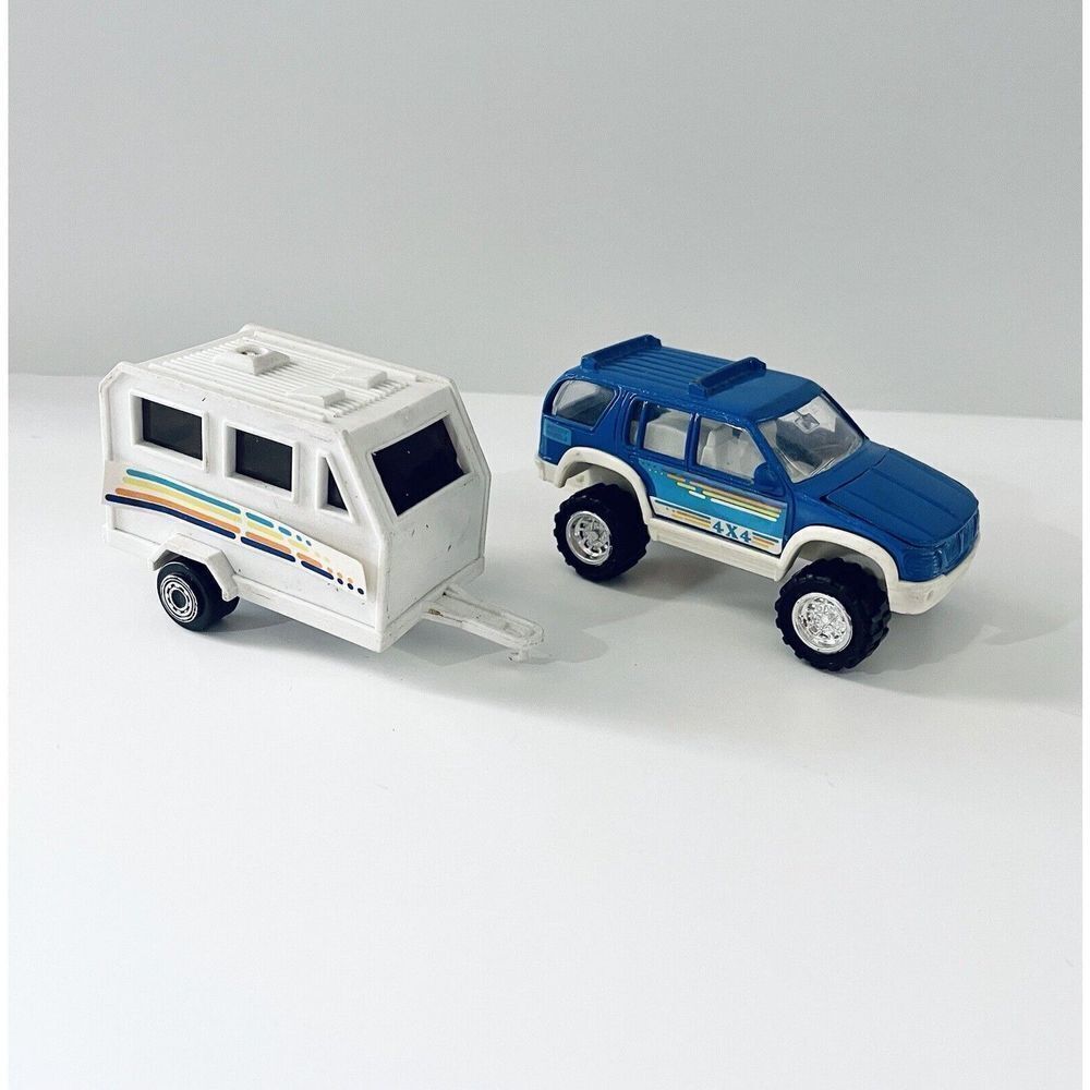 VINTAGE SOMA DIE-CAST METAL AND PLASTIC MIGHTY WHEELS BLUE 4X4 & TRAILER‎